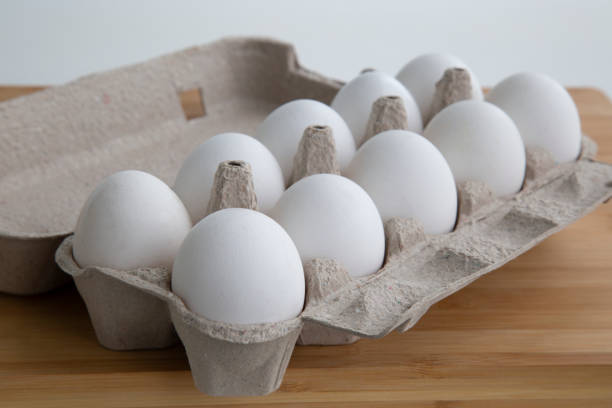 istock Chicken eggs for cooking. White and brown eggs. 1172270455