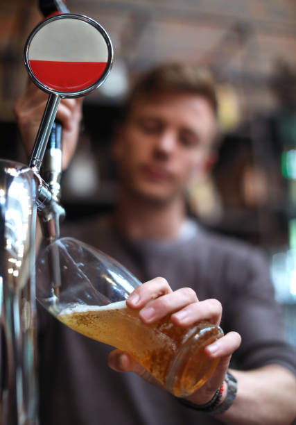 istock Barman pouring a beer. 1172275117