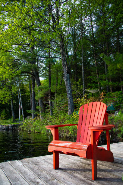 istock Red lake chair on a dock in Quebec 1172277668