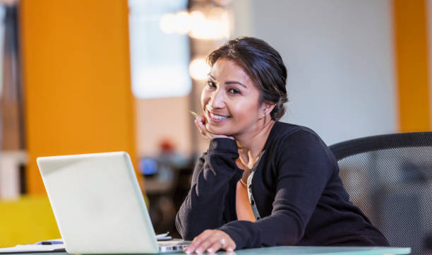 istock Pacific Islander businesswoman using laptop 1172277682