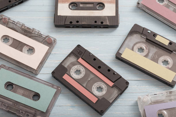 istock Old plastic cassette on wooden background. Retro music concept 1172278021