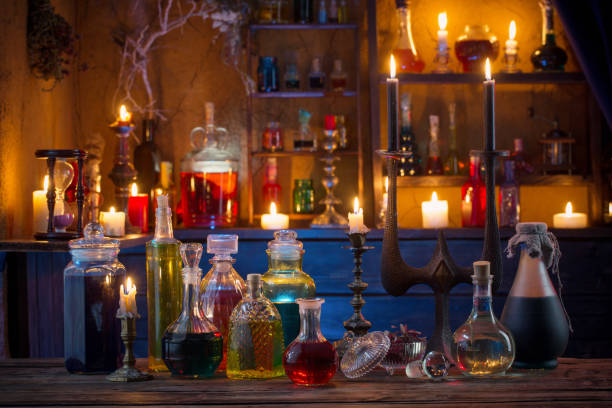 istock magic potions in bottles on wooden background 1172278154
