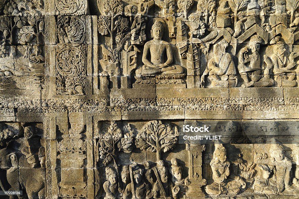Los tallados en piedra del templo de Borobudur en Indonesia - Foto de stock de Borobudur libre de derechos