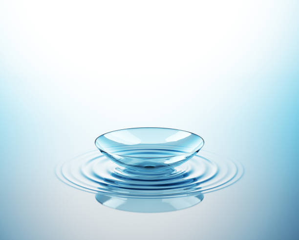 Contact Lens On The Water Contact lens. Optometry background. Concept. 3D Render lens eye stock pictures, royalty-free photos & images