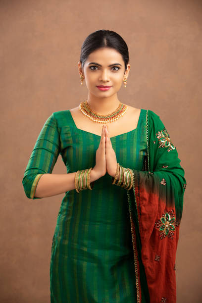 istock Indian young Muslim girl greeting in studio shot. 1172283736