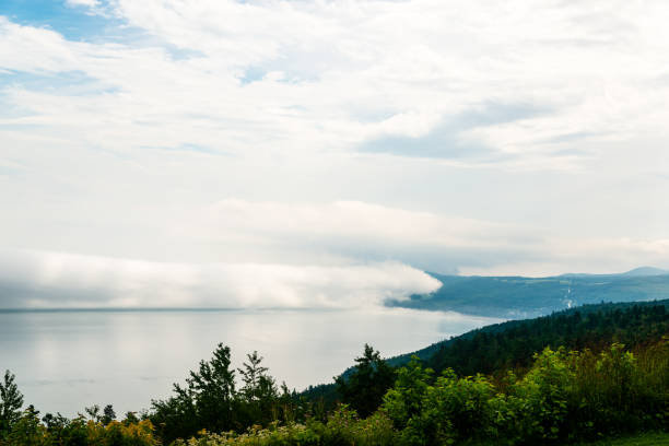 istock Foggy day by the St-Laurent river, golf field 1172287595