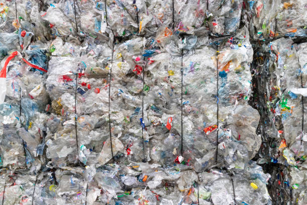 Plastics recycling centers and raw material Plastics recycling centers and its raw material as collection, preparation and transformation polypropylene stock pictures, royalty-free photos & images