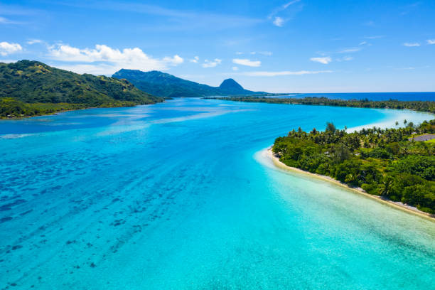 Aerial view of French Polynesia Tahiti island Huahine and Motu coral reef lagoon stock photo