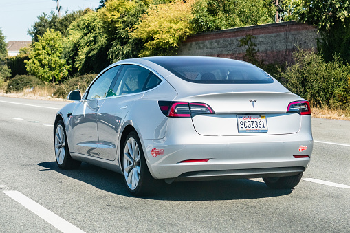 August 31, 2019 Mountain View / CA / USA - Tesla Model 3 driving on the freeway