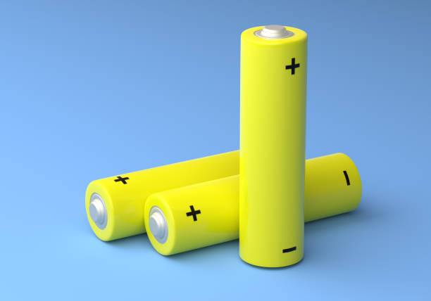 istock Two yellow AA size batteries isolated on blue background 1172294166