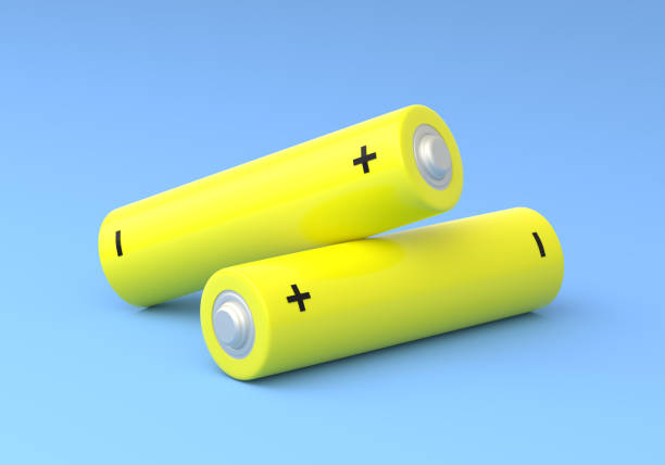 istock Two yellow AA size batteries isolated on blue background 1172294221