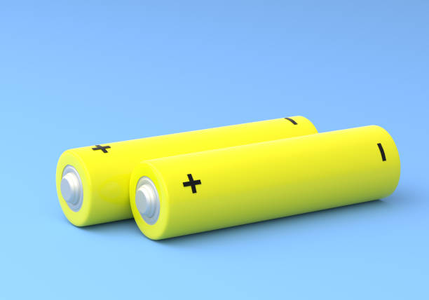 istock Two yellow AA size batteries isolated on blue background 1172294291