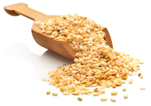 sesame seeds - sesame seed spoon scoop imagens e fotografias de stock