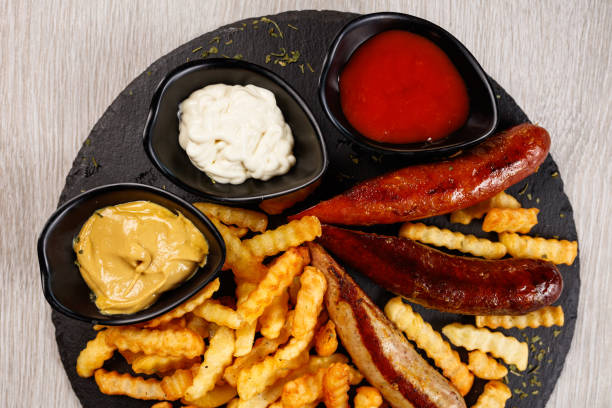 istock Delicious sausage served with fries 1172296146