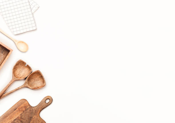 istock Wooden kitchen utensils on white background. Flat lay, top view. 1172297170