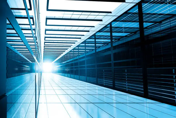 Photo of Modern web network and internet telecommunication technology, big data storage and cloud computing computer service business concept: server room interior in datacenter in blue light. 3D render