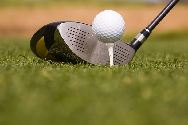 istock Driving club with golf ball on tee 117230055