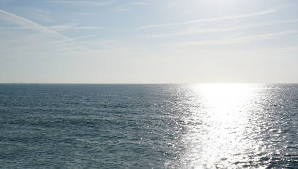 istock Empty sea to the horizon, daytime. Visible light path on the water. 1172310773