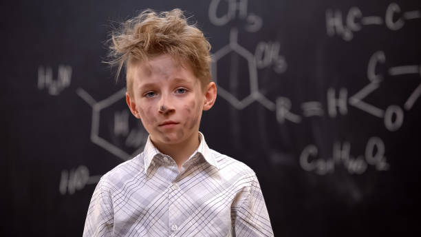 istock Sad dirty boy feeling guilty after explosion during chemical experiment, lesson 1172311797