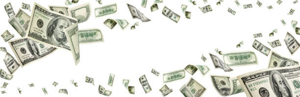 istock Hundred dollar bill. Falling money isolated background. American 1172318558