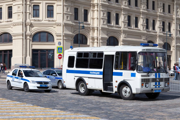 Moscow, Russia - July 08 2018: A bus and two cars of police parked near the Bolshoi.
