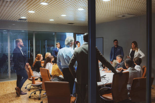 istock Coworkers in meeting late at night 1172320232
