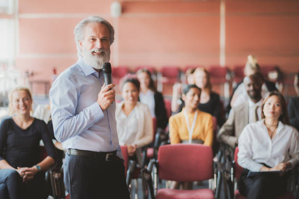 istock Businessman lectures at conference event 1172320949