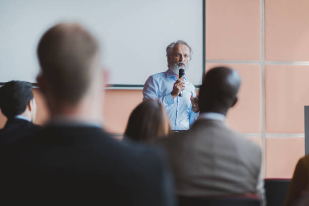 istock Businessman lectures at conference event 1172320998
