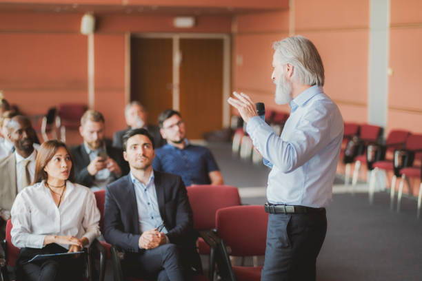 istock Businessman lectures at conference event 1172321960