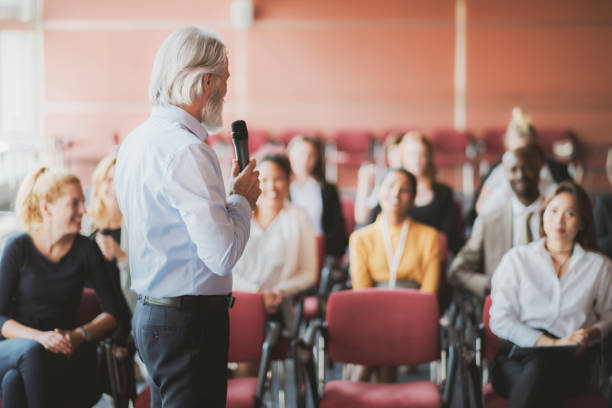 istock Businessman lectures at conference event 1172322237