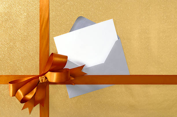 istock Gold gift with ribbon 117232297
