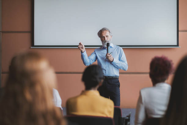 istock Businessman lectures at conference event 1172323112