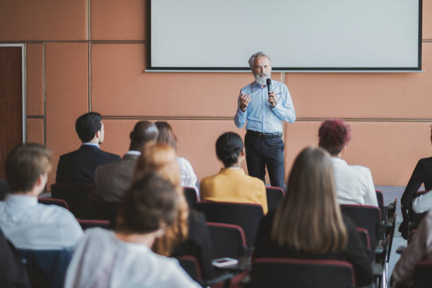 istock Businessman lectures at conference event 1172324218