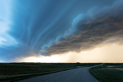 Driving along high way 363 , south of Moose Jaw. Prairie storm approaching. Image taken from a tripod.