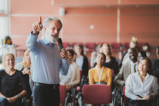 istock Businessman lectures at conference event 1172324367