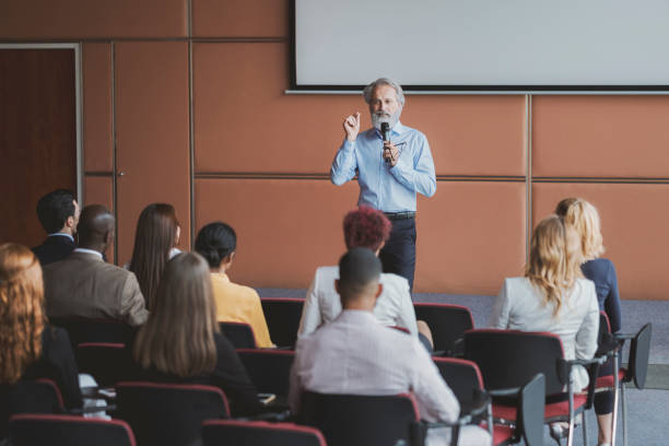 istock Businessman lectures at conference event 1172326136