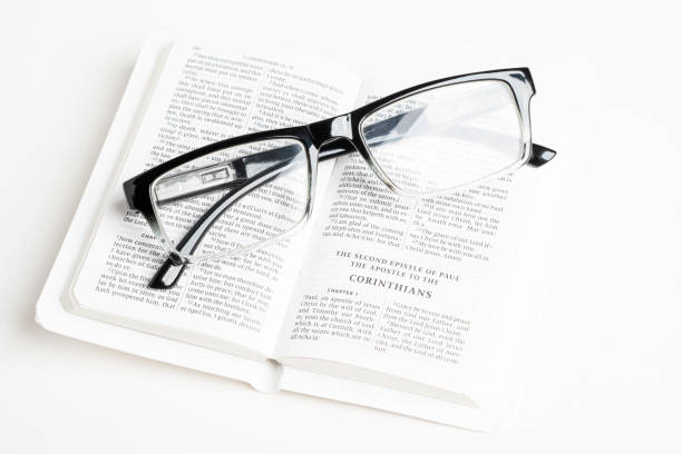 istock White Pocket Bible With A Pair Of Reading Glasses 1172333358