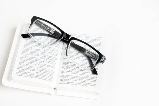 istock White Pocket Bible With A Pair Of Reading Glasses 1172333363
