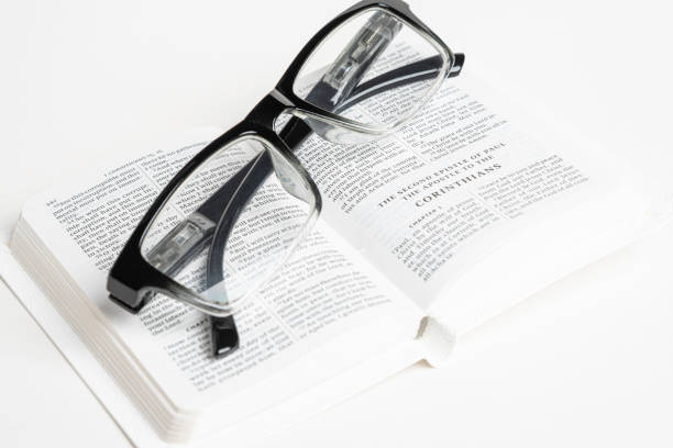 istock White Pocket Bible With A Pair Of Reading Glasses 1172333396