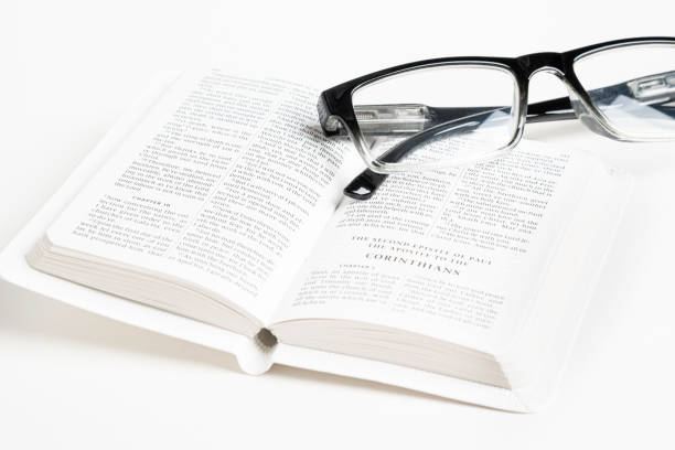 istock White Pocket Bible With A Pair Of Reading Glasses 1172333406
