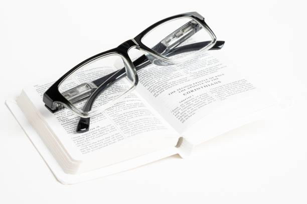 istock White Pocket Bible With A Pair Of Reading Glasses 1172333424