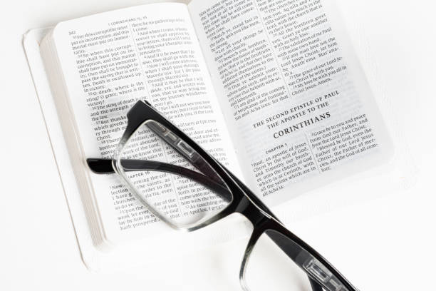 istock White Pocket Bible With A Pair Of Reading Glasses 1172333434
