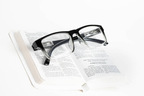 istock White Pocket Bible With A Pair Of Reading Glasses 1172333452