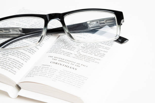 istock White Pocket Bible With A Pair Of Reading Glasses 1172333473