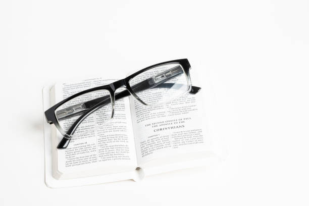istock White Pocket Bible With A Pair Of Reading Glasses 1172333535