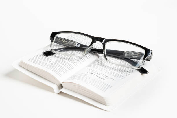istock White Pocket Bible With A Pair Of Reading Glasses 1172333548