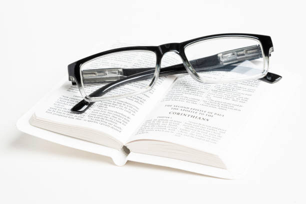 istock White Pocket Bible With A Pair Of Reading Glasses 1172333556