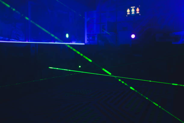 Laser tag play arena with fluorescent paint, energiser room