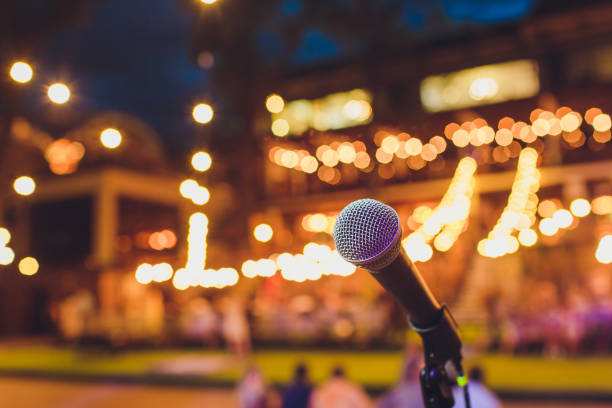 istock Microphone on stage for opening ceremony and performances. Blurring the movie scene. 1172334846