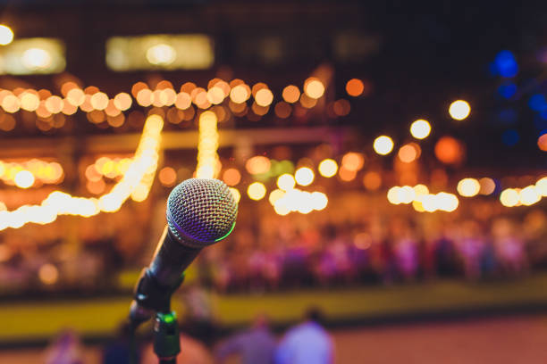 istock Microphone on stage for opening ceremony and performances. Blurring the movie scene. 1172334850